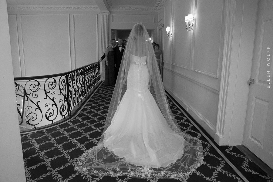 back of the wedding gown with an embellished cathedral veil