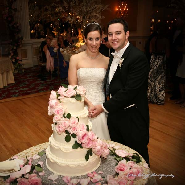 blog_0960-cutting the 5 tiered wedding cake